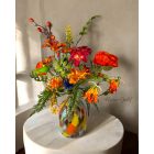 Gloriosa virágkompozíció  üveg váza